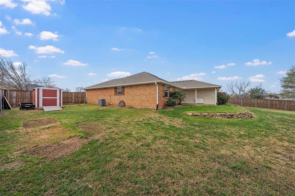 4401 Lacey Circle Waco, TX 76708 - Photo 33 of 38 a front view of house with yard and green space
