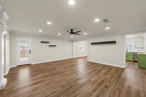 a view of a livingroom with wooden floor