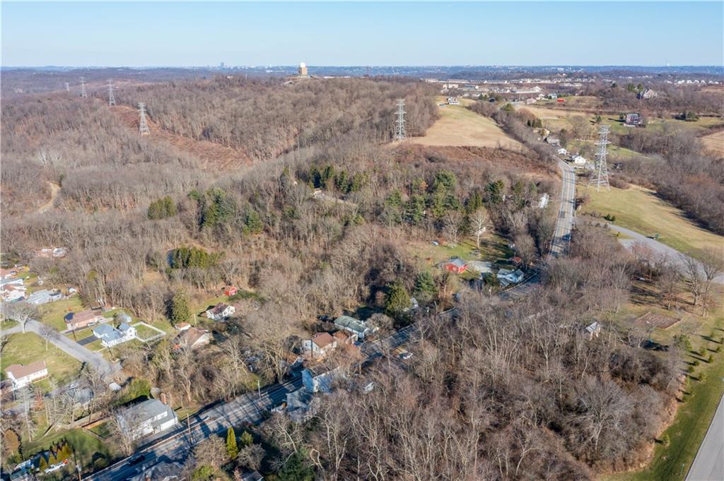 642 Seminary Avenue Oakdale, PA 15071 - Photo 13 of 15 an aerial view of house with yard and mountain in the background