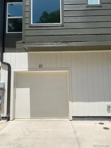 a view of a door and a window