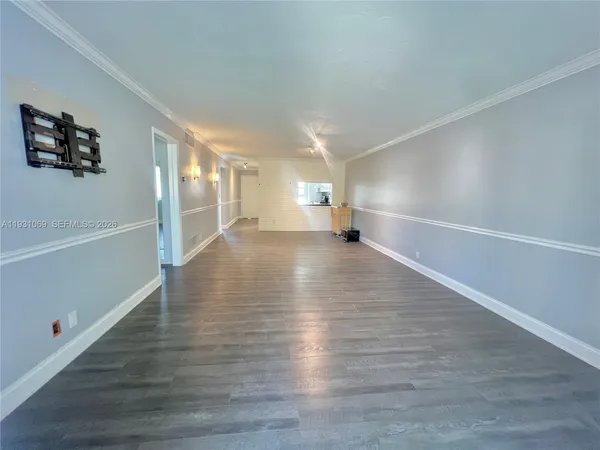 a kitchen with stainless steel appliances a refrigerator and a stove