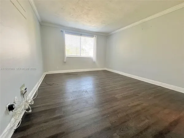 a bathroom with a shower and a toilet