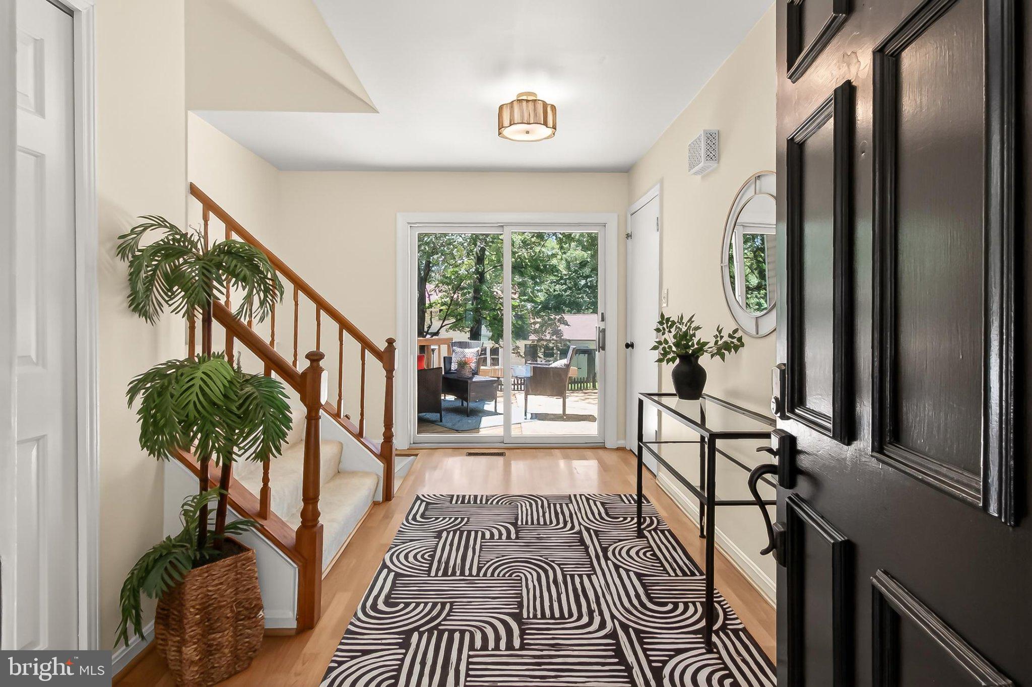 6908 Rochambeau Place Springfield, VA 22153 - Photo 7 of 70 Bright 14 foot long foyer w/sliding doors to rear