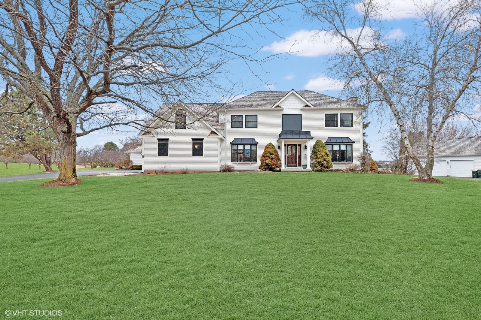 1460 Eagle Ridge Drive Antioch, IL 60002 - Photo 1 of 47 a front view of house with yard and green space