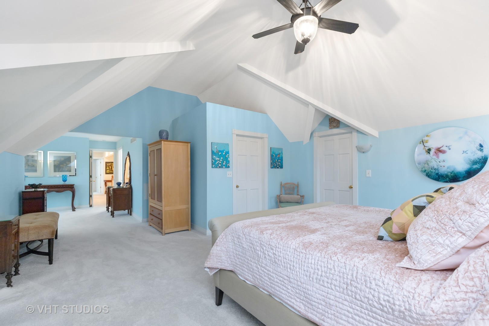 1460 Eagle Ridge Drive Antioch, IL 60002 - Photo 21 of 47 a bedroom with a bed and a chandelier
