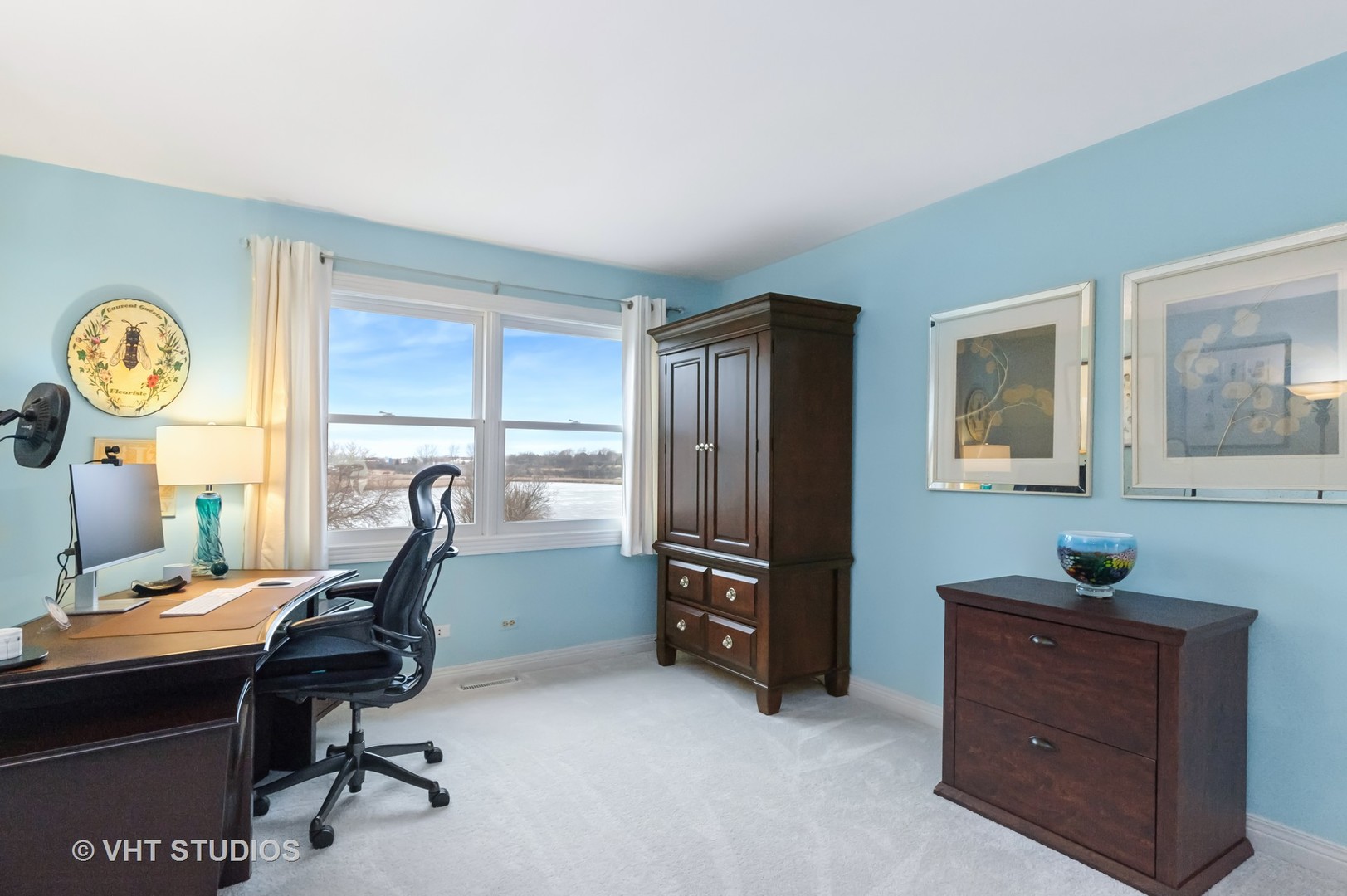 1460 Eagle Ridge Drive Antioch, IL 60002 - Photo 22 of 47 a view of a workspace with furniture and a window