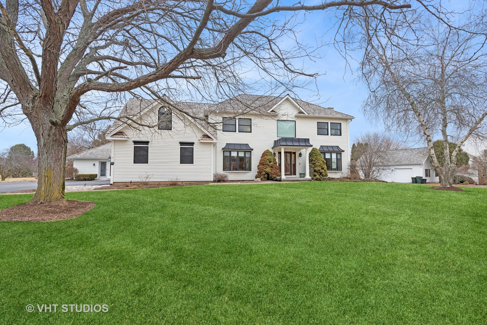 1460 Eagle Ridge Drive Antioch, IL 60002 - Photo 3 of 47 a front view of a house with a yard