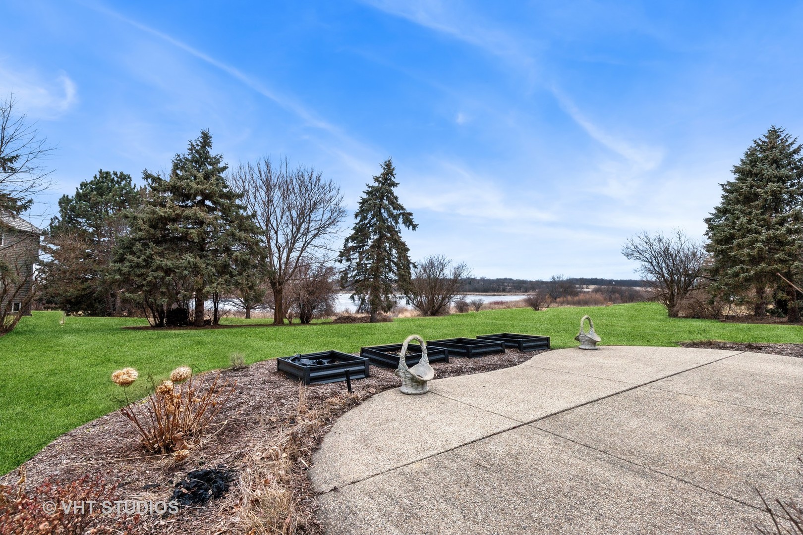 1460 Eagle Ridge Drive Antioch, IL 60002 - Photo 38 of 47 a view of a park with large trees and a barn