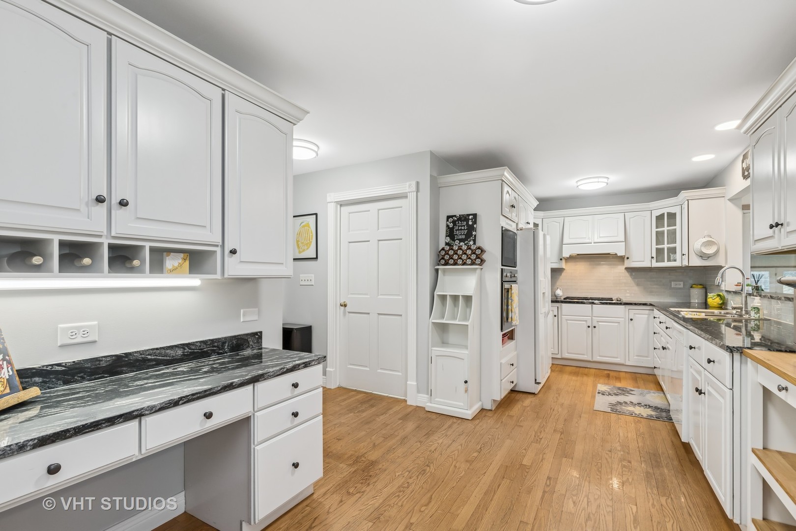 1460 Eagle Ridge Drive Antioch, IL 60002 - Photo 6 of 47 a kitchen with stainless steel appliances granite countertop a stove and a refrigerator