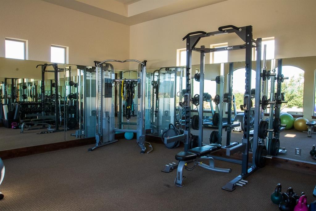 404 Strada Luca Florence, TX 76527 - Photo 18 of 25 a view of a room with gym equipment