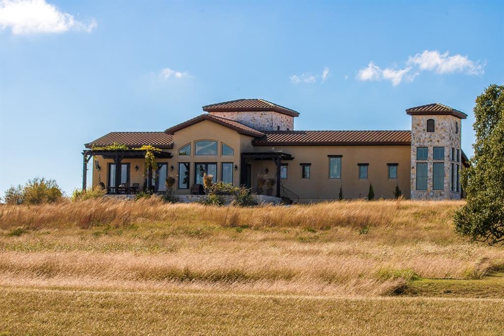 404 Strada Luca Florence, TX 76527 - Photo 20 of 25 a front view of a house with a yard