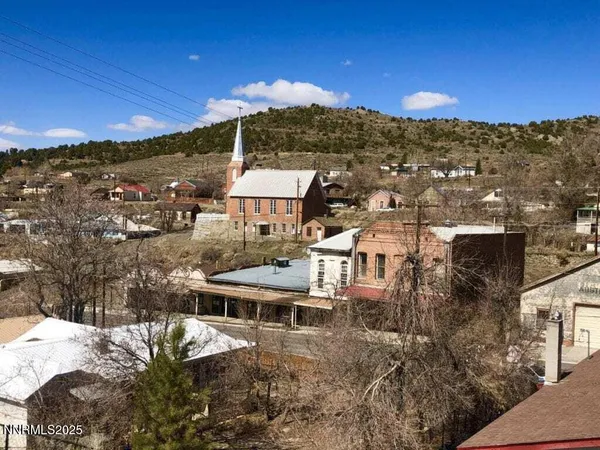 a city view with tall trees