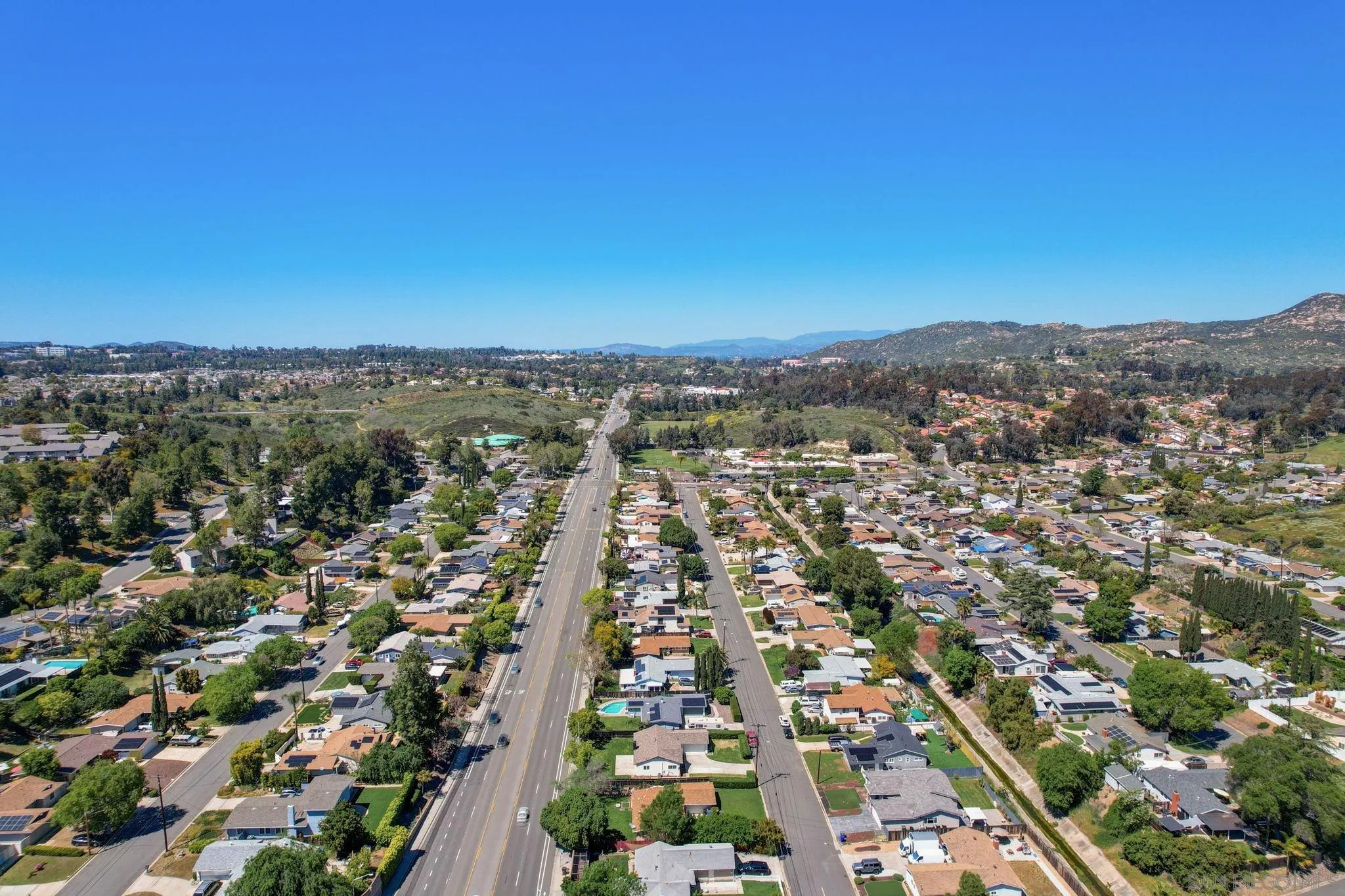 14116 Powers Road Poway, CA 92064 - Photo 59 of 63 an aerial view of residential houses with outdoor space and trees