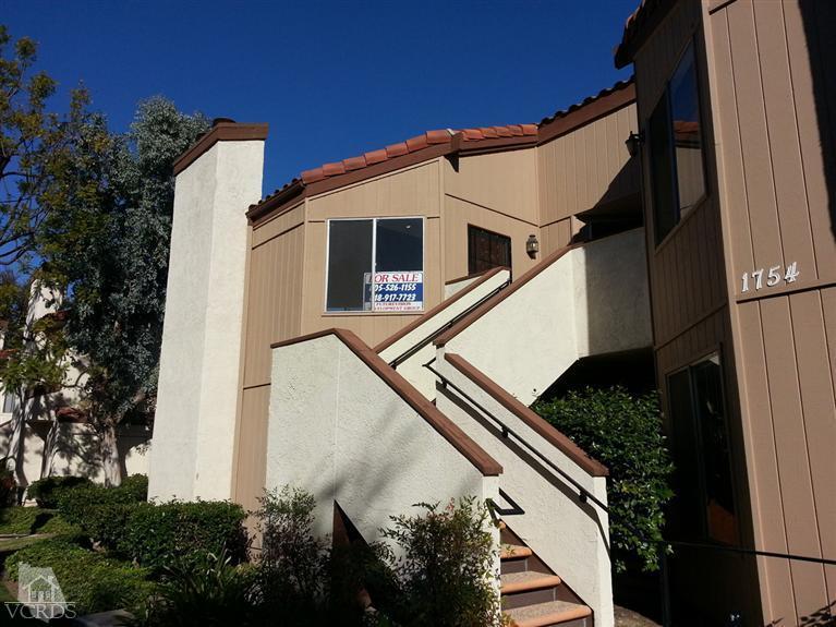 1754 Sinaloa Road, Unit 276 Simi Valley, CA 93065 - Photo 1 of 13 a house view with a backyard space