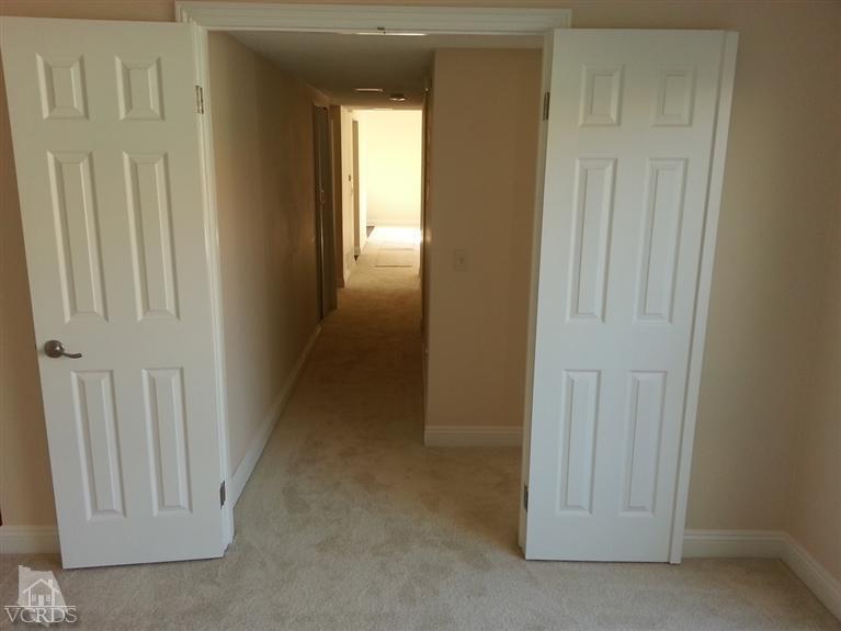 1754 Sinaloa Road, Unit 276 Simi Valley, CA 93065 - Photo 10 of 13 a view of a hallway with front door