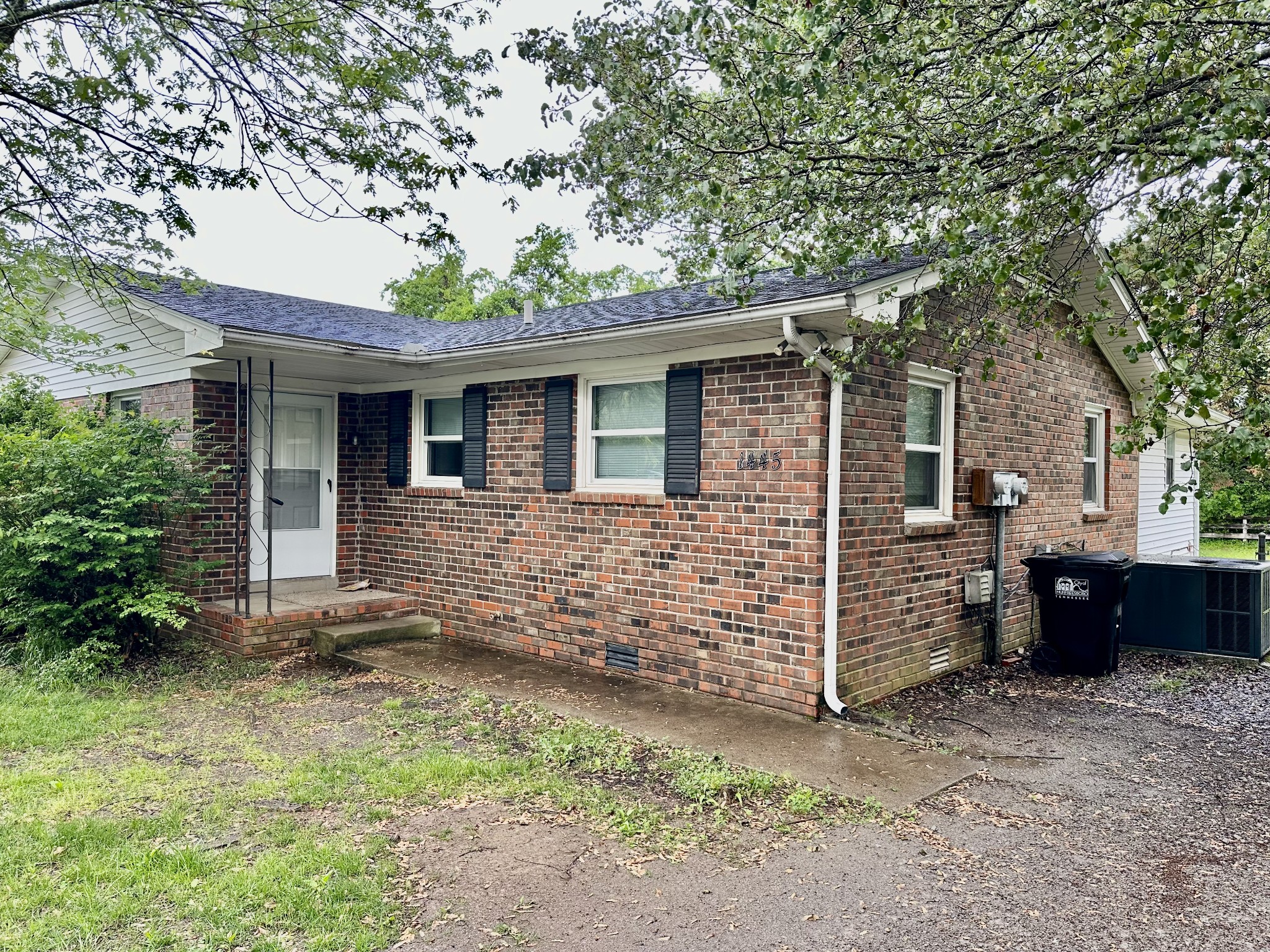 1445 Old Lascassas Road Murfreesboro, TN 37130 - Photo 1 of 18 front view of a house with a large tree