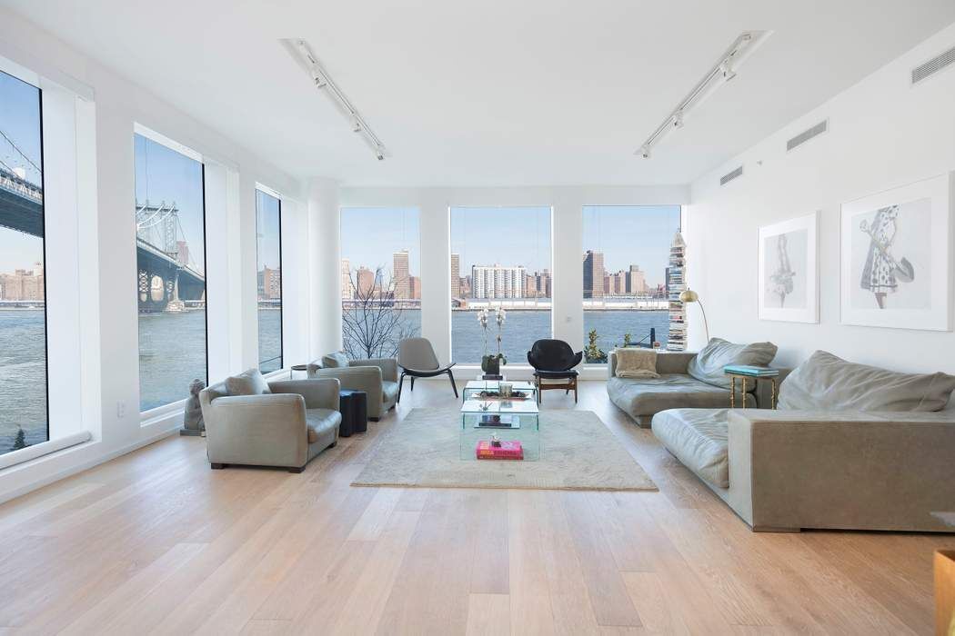 a living room with furniture and a couch