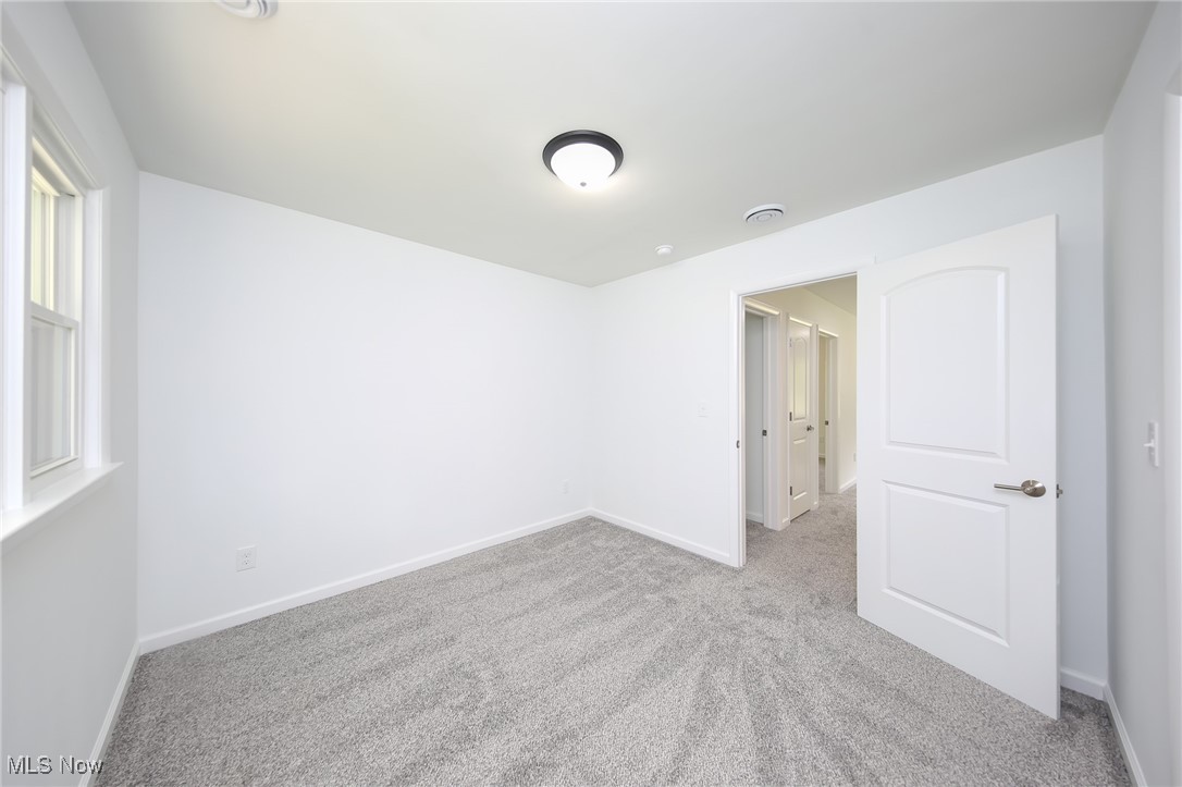 6544 Neff Road Valley City, OH 44280 - Photo 17 of 45 Empty room with light carpet