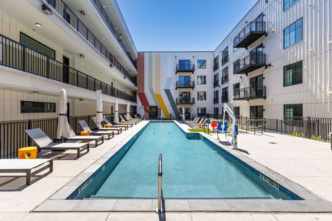 4315 South Congress Avenue, Unit 527 Austin, TX 78745 - Photo 23 of 37 a view of swimming pool with outdoor seating