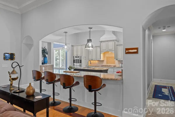 a very nice looking dining room with a table and chairs