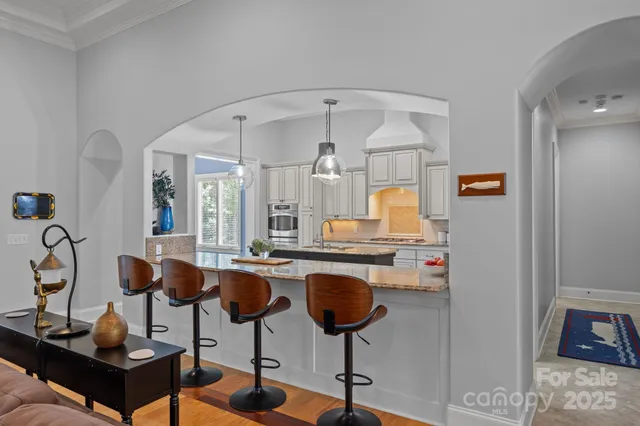 a very nice looking dining room with a table and chairs