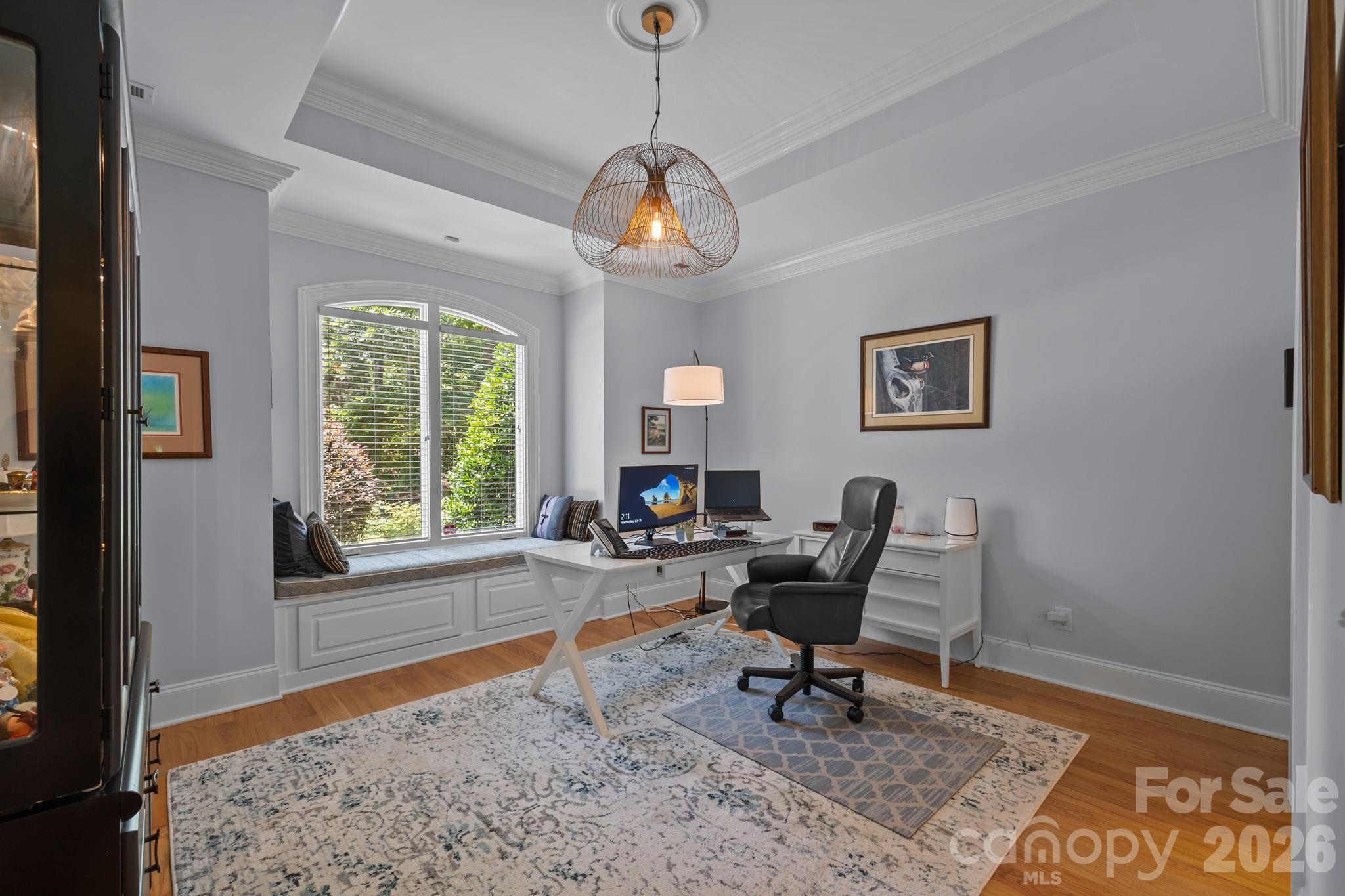 242 Anniston Way Davidson, NC 28036 - Photo 23 of 42 a living room with furniture and a window