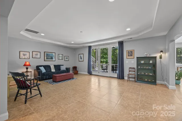 a living room with furniture and a table