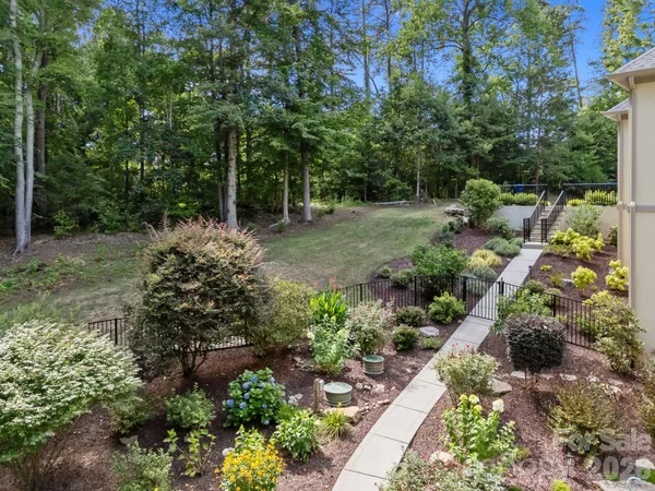 an aerial view of a house with outdoor space