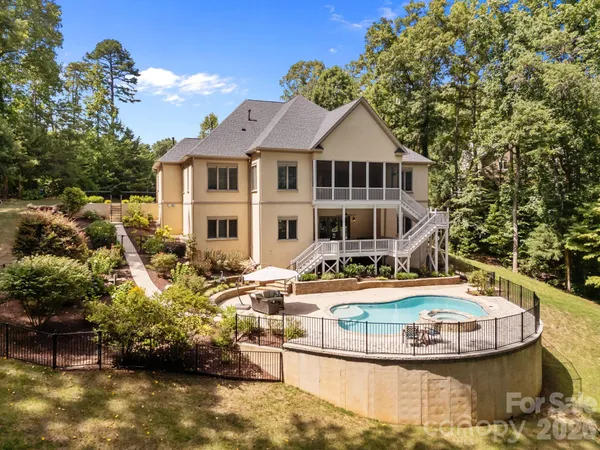 a front view of a house with swimming pool