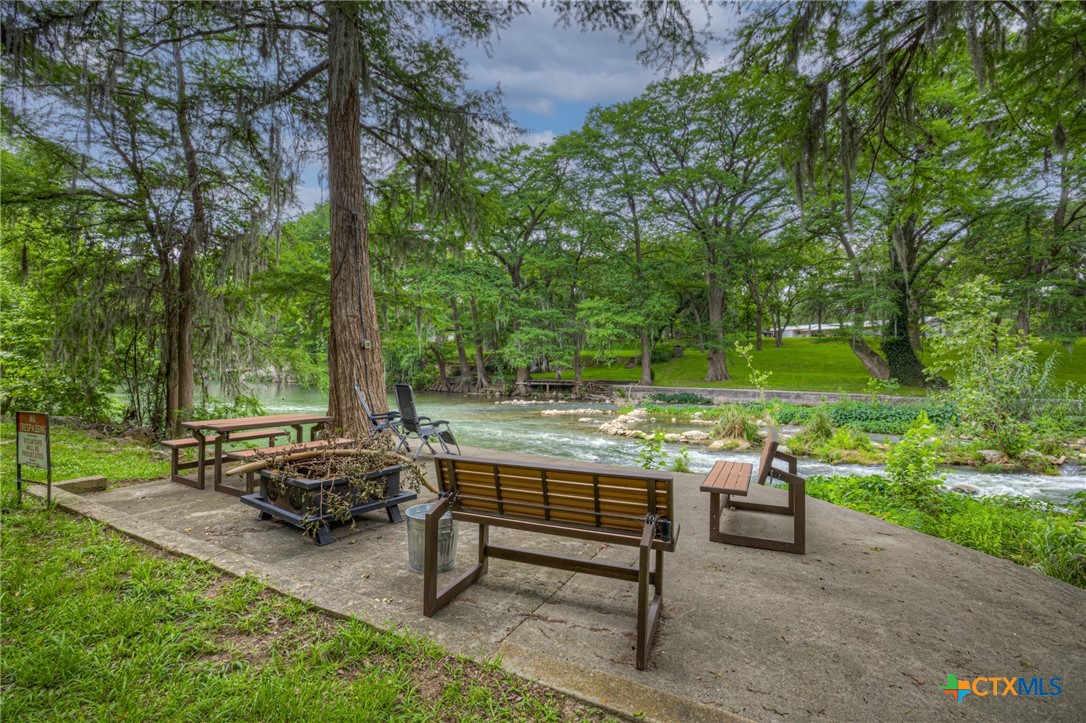 1029 Gruene Road New Braunfels, TX 78130 - Photo 38 of 48 a backyard view with a sitting space