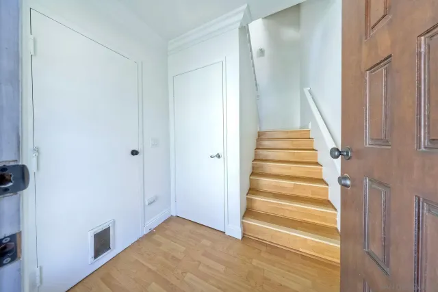 a view of an entryway with staircase