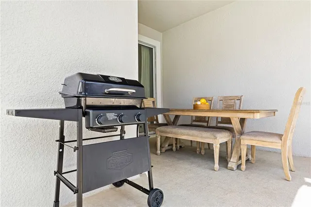 a view of a swimming pool with a yard