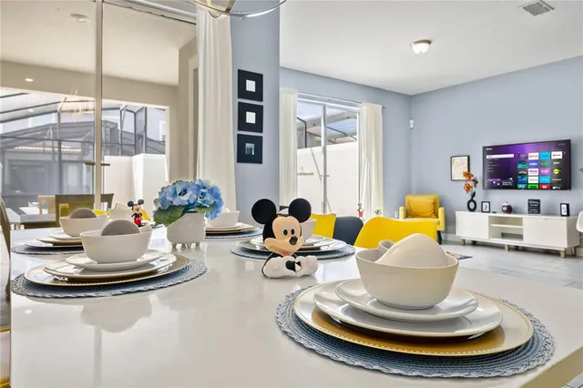 a view of a dining room with furniture