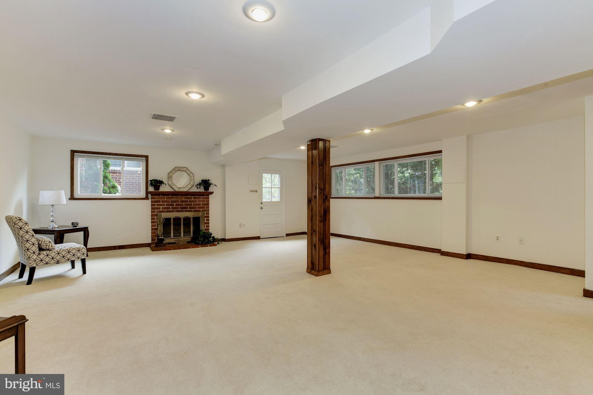105 Belton Road Silver Spring, MD 20901 - Photo 14 of 18 a view of livingroom with furniture and windows