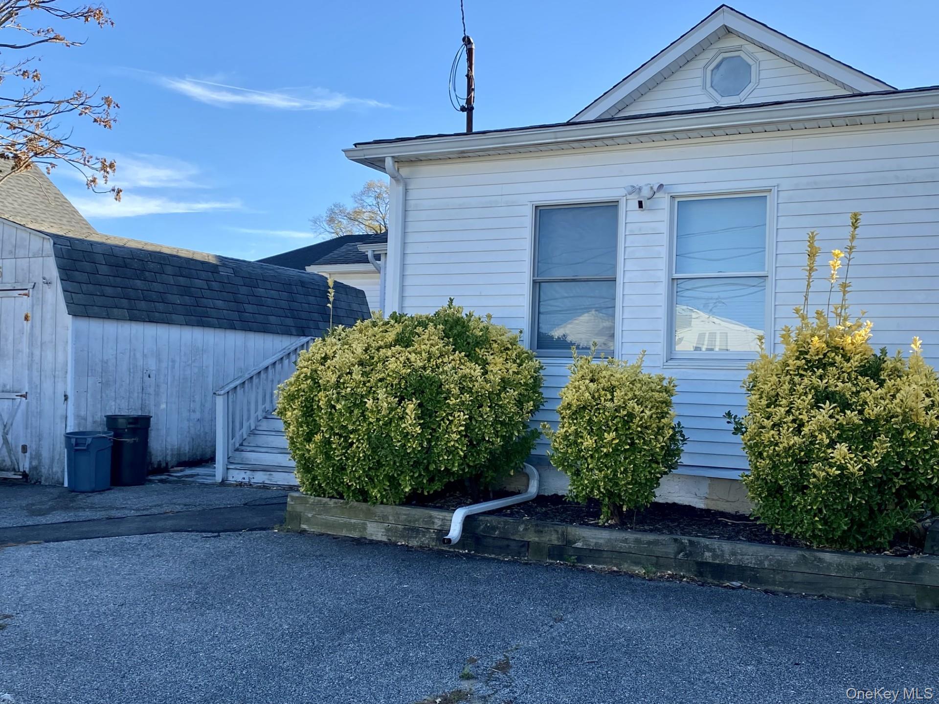 115 Barbara Road Bellmore, NY 11710 - Photo 13 of 13 Front of House + Shed For Storage