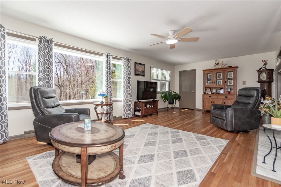 10495 Mulberry Road Chardon, OH 44024 - Photo 5 of 48 Living area with a wealth of natural light, wood finished floors.