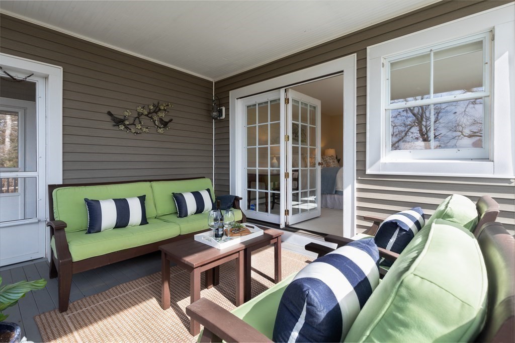 105 Parker Road, Unit A Barnstable, MA 02655 - Photo 14 of 37 a bedroom with furniture and a window