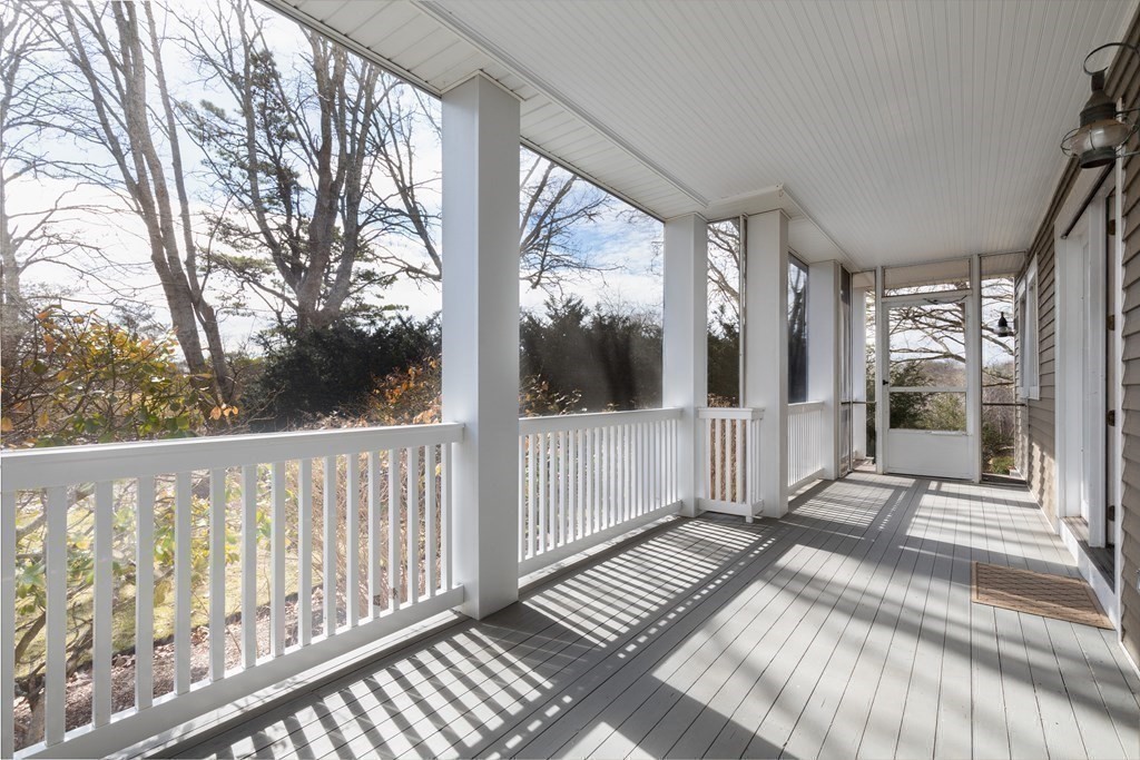 105 Parker Road, Unit A Barnstable, MA 02655 - Photo 20 of 37 a view of a balcony with wooden floor