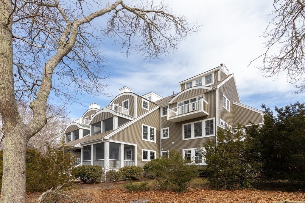 105 Parker Road, Unit A Barnstable, MA 02655 - Photo 24 of 37 a front view of a house with a yard