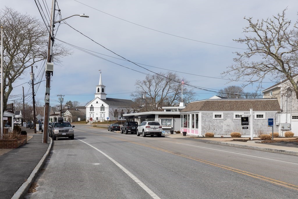 105 Parker Road, Unit A Barnstable, MA 02655 - Photo 31 of 37 a car parked on the side of a street
