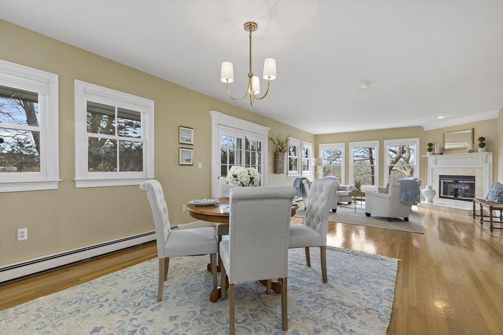 105 Parker Road, Unit A Barnstable, MA 02655 - Photo 6 of 37 a view of a dining room with furniture window and wooden floor