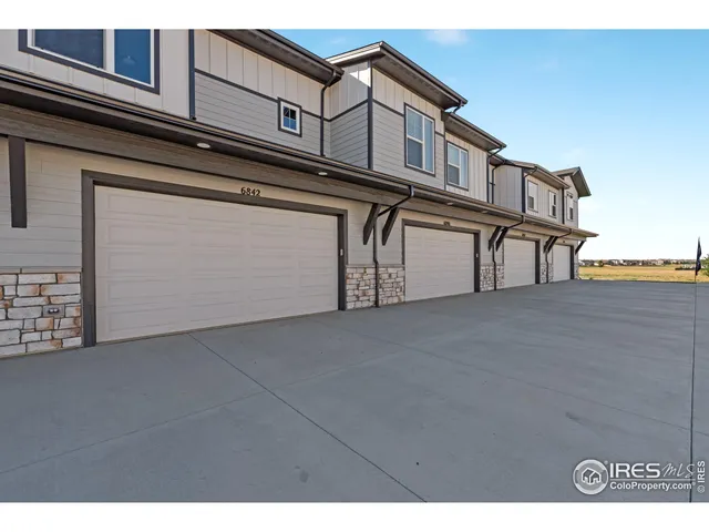 a view of a house with a garage