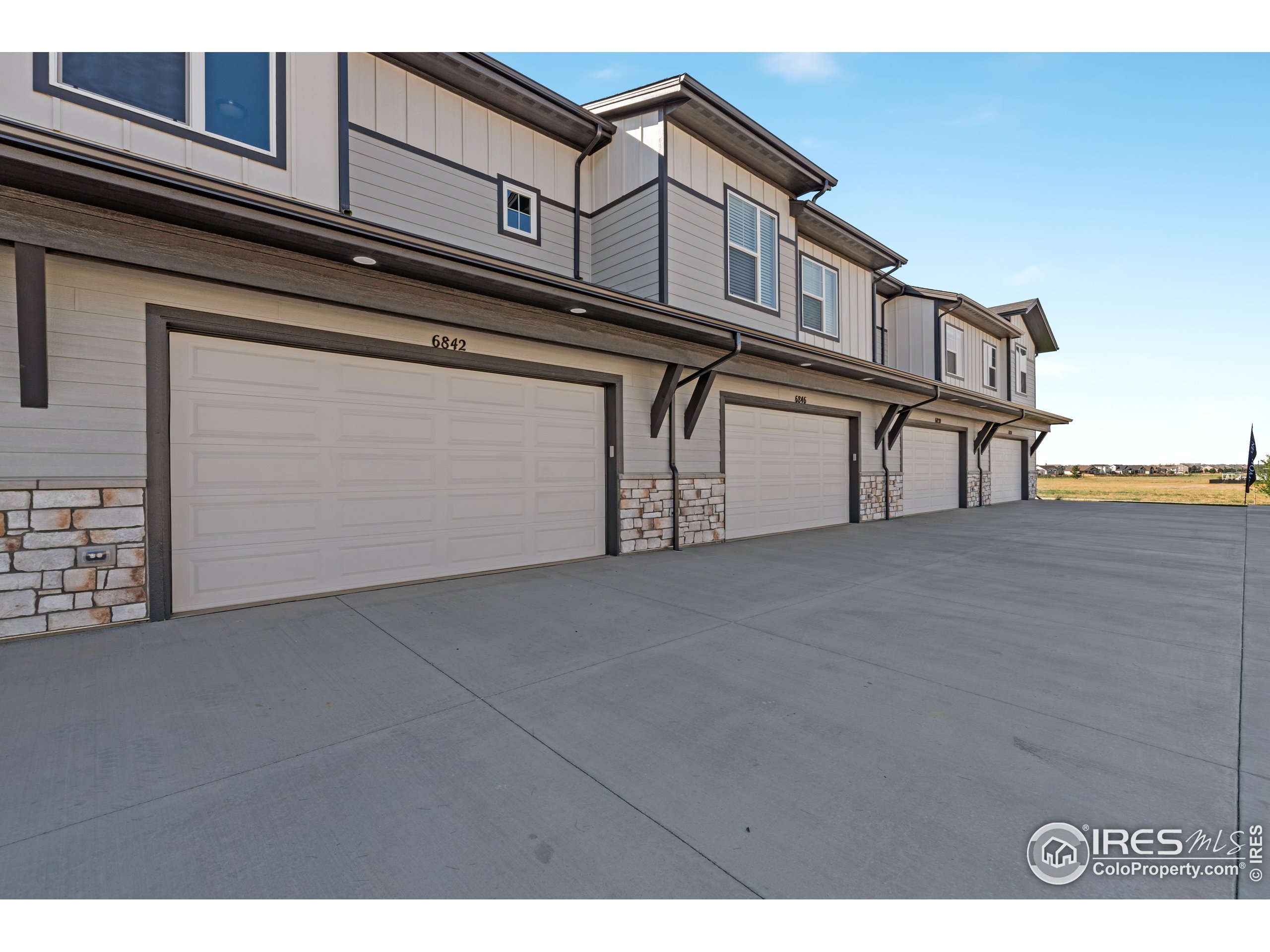 6780 Maple Leaf Drive Timnath, CO 80547 - Photo 26 of 26 a view of a house with a garage