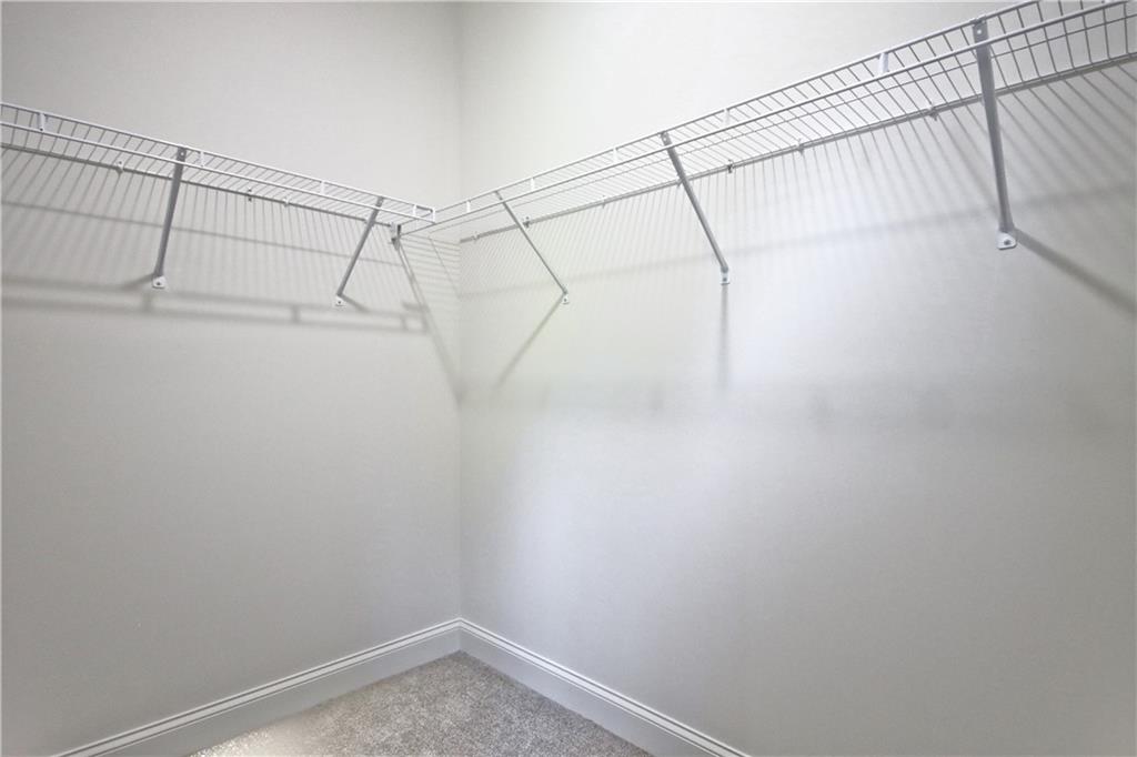 5985 Spring Way Lithonia, GA 30058 - Photo 24 of 34 a view of a room with racks on the wall