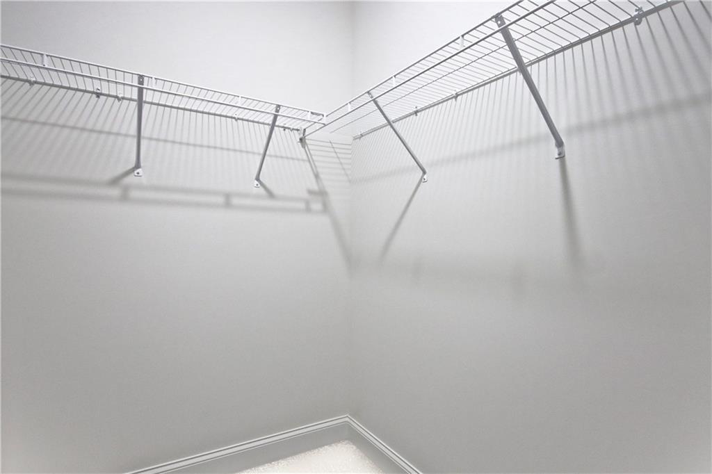 5985 Spring Way Lithonia, GA 30058 - Photo 25 of 34 a view of a room with racks on the wall