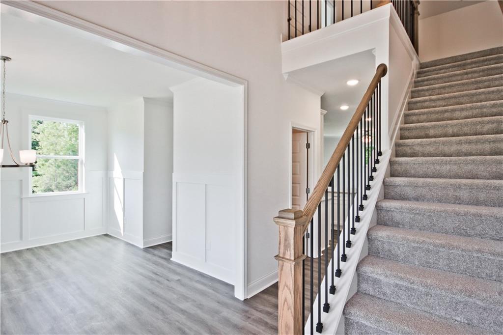 5985 Spring Way Lithonia, GA 30058 - Photo 3 of 34 a view of entryway with wooden floor and stairs