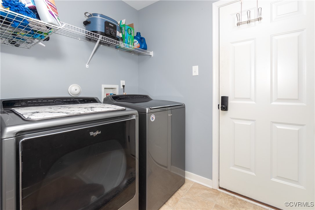 1990 Walnut Tree Road Powhatan, VA 23139 - Photo 13 of 40 a utility room with dryer and washer