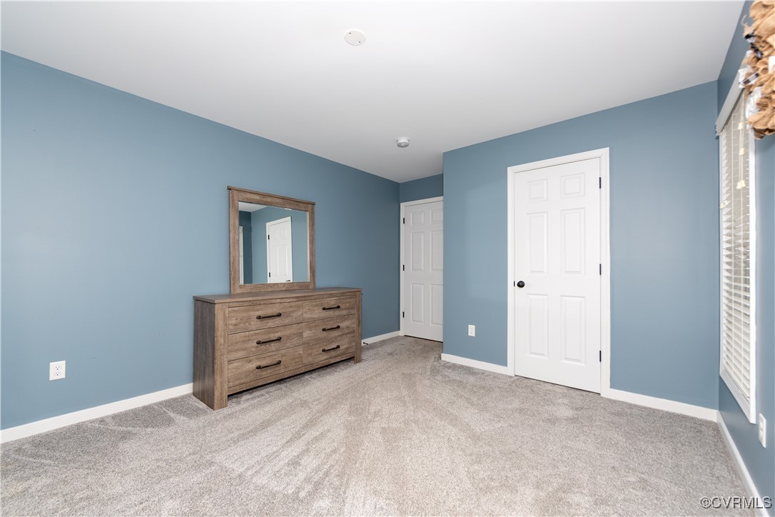 1990 Walnut Tree Road Powhatan, VA 23139 - Photo 19 of 40 an empty room with mirror and window