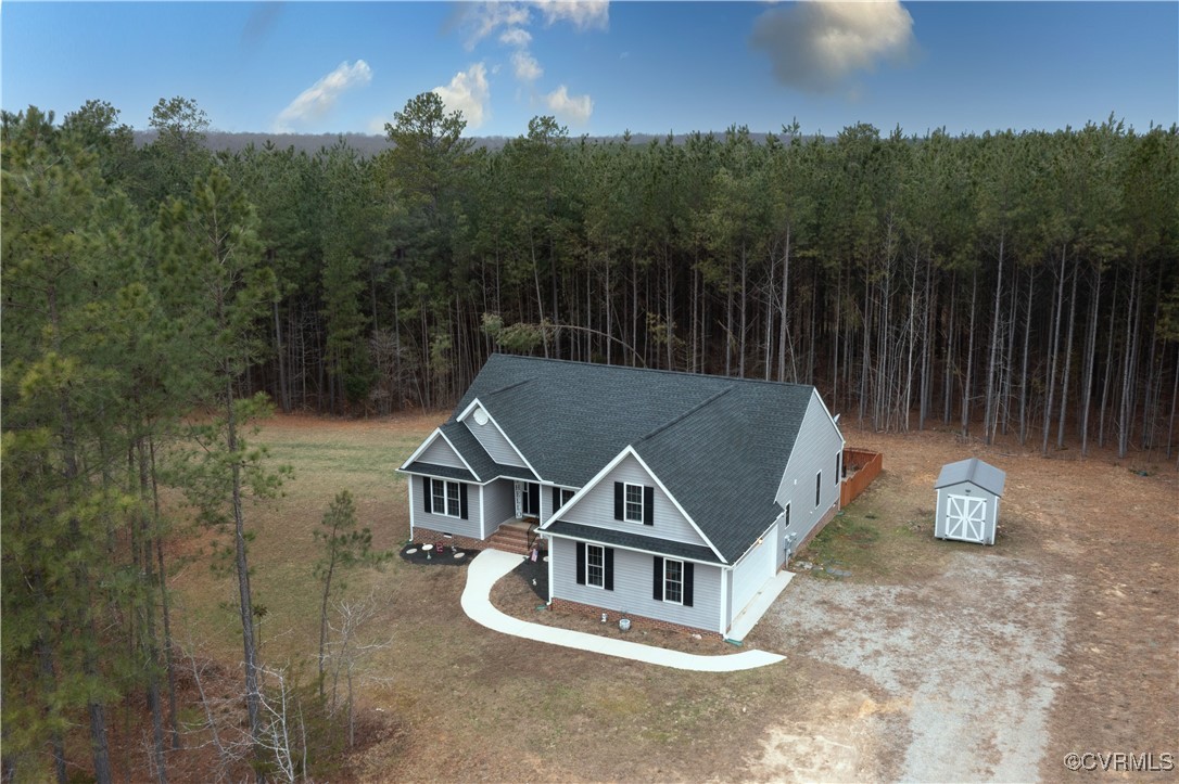 1990 Walnut Tree Road Powhatan, VA 23139 - Photo 26 of 40 a house with trees in the background
