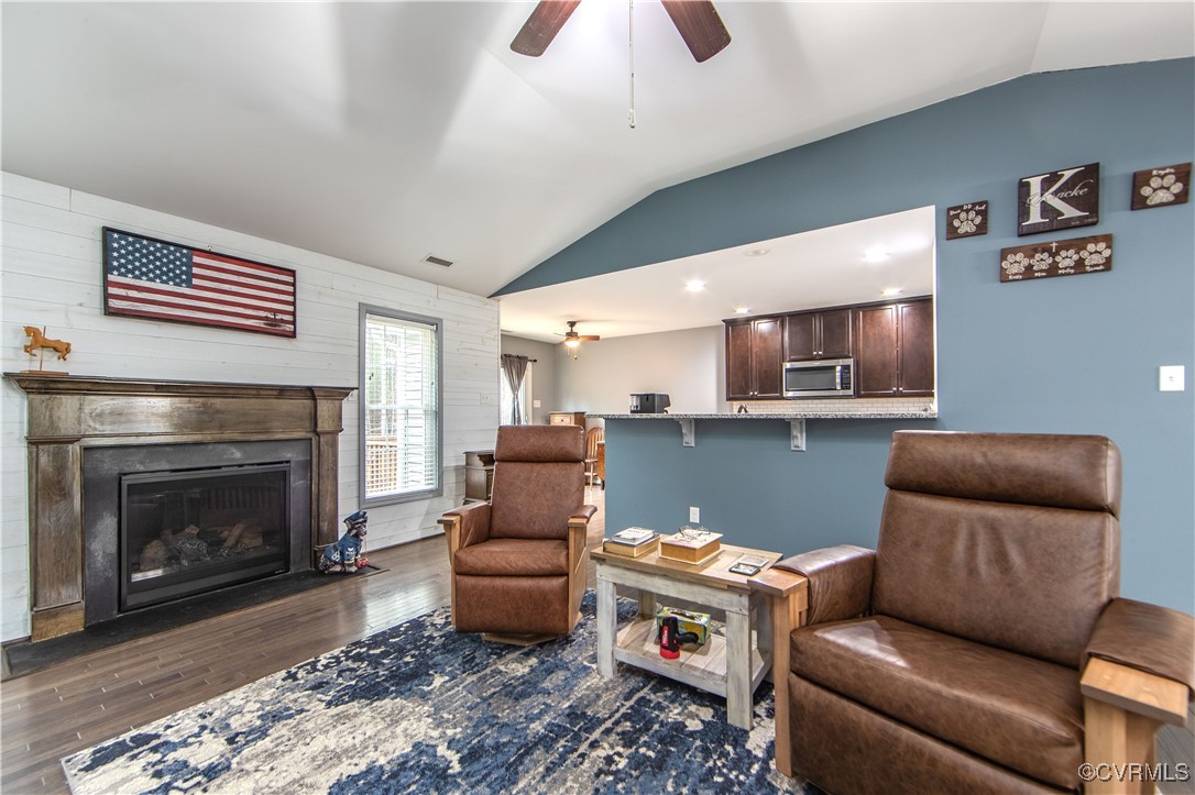 1990 Walnut Tree Road Powhatan, VA 23139 - Photo 9 of 40 a living room with furniture and a fireplace